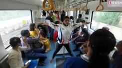 Nagpur students perform yoga in a metro train