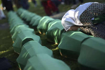 Thousands gather to mark Srebrenica massacre, bury victims