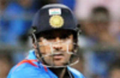 Dhoni's bat goes for 100,000 pounds at charity auction | Off the field ...