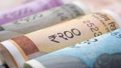 Rupee at record low tracking weak Asian peers, shares