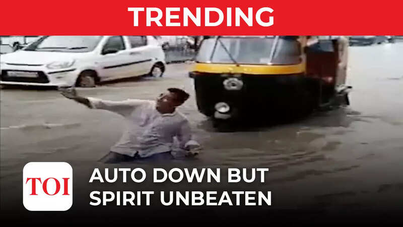 netizens: Viral video: Bhopal auto rickshaw driver's rain dance has ...
