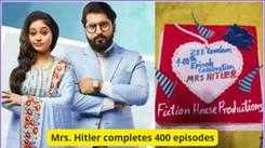 Mrs. Hitler completes 400 episodes; the team celebrates with a cake cutting