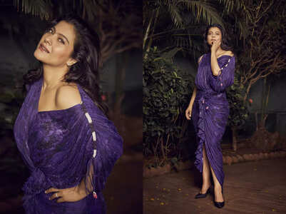 Kajol looks smoking hot in a purple draped dress