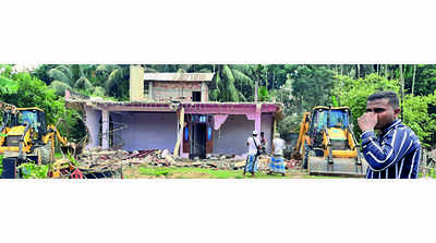 90 houses built on Assam government tea estate land razed