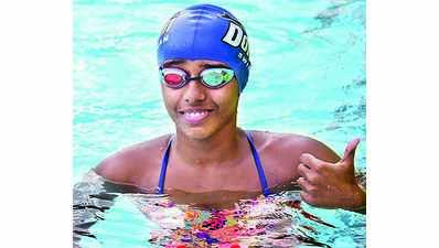 Gritty Dhinidhi shatters 100m butterfly record