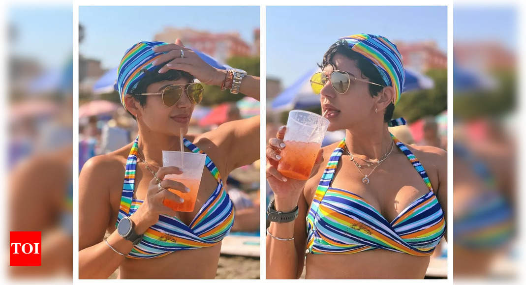 Fans feel Mandira Bedi is ‘reverse-ageing’ as she stuns in striped bikini in photos from her Spain holidays – Times of India