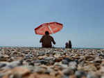 UK residents beat the heat as the country records highest ever temperature; see pics