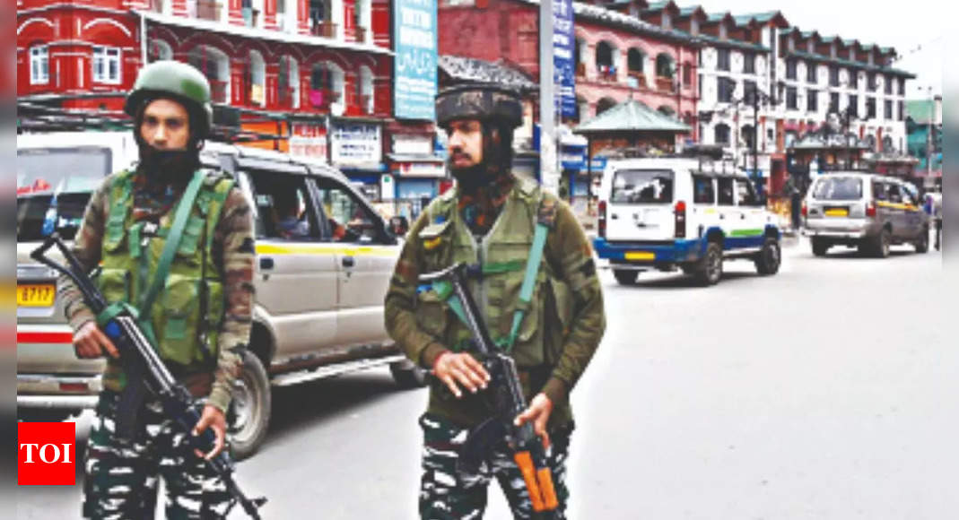 Terror conspiracy: NIA raids 9 locations in Kashmir Valley | India News – Times of India