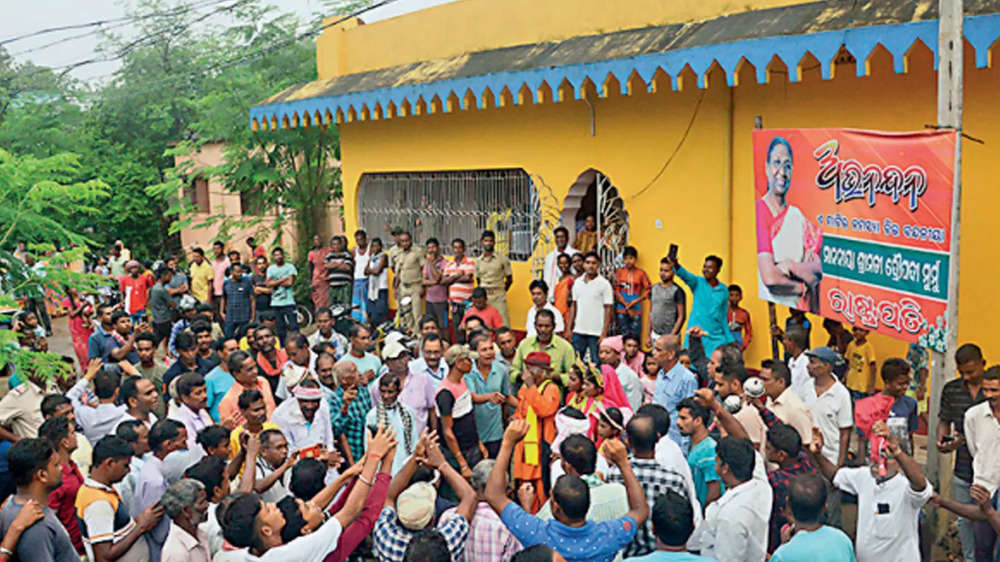 Family members and villagers of Uparbeda celebrate Droupadi Murmu’s victory