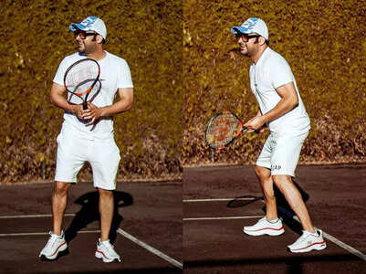 Kapil gets on the field to play tennis; pics