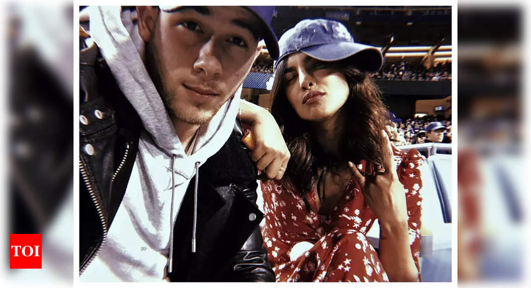 Priyanka Chopra and Nick Jonas twin in black as they groove at Kenny Chesney’s concert – WATCH VIDEO – Times of India