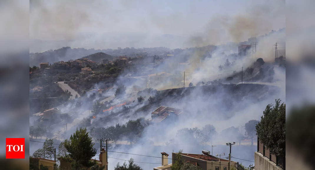 Wildfires burn coastal homes, forests in Greece as Europe’s heatwave spreads east – Times of India