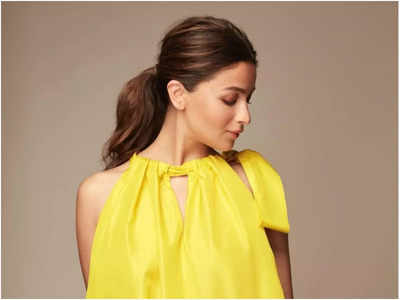 Mom-to-be Alia Bhatt makes a strong case of maternity fashion in a satin yellow dress