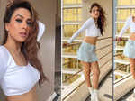 Nia Sharma raises temperature in white crop top and micro mini blue unbuttoned skirt