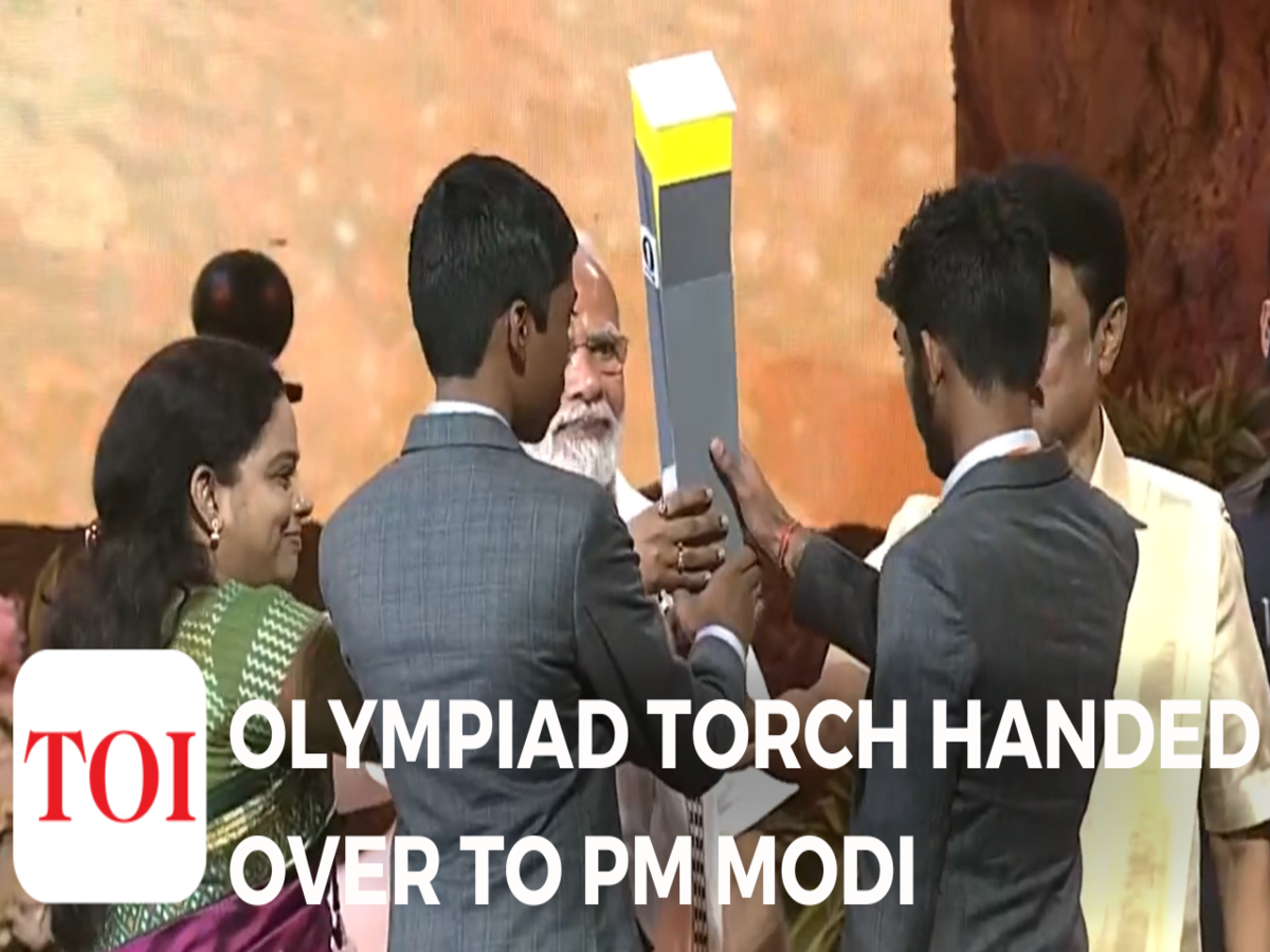 Yogi hands over Chess Olympiad torch to Viswanathan Anand