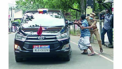 Youth Congress activist jumps in front of CM’s car, waves black flag