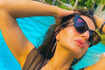 From stylish bikinis to her pictures in floral bralettes, Ameesha Patel surely knows how to steal hearts!