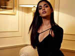 Rubal Shekhawat turns heads in a black thigh-high slit gown.