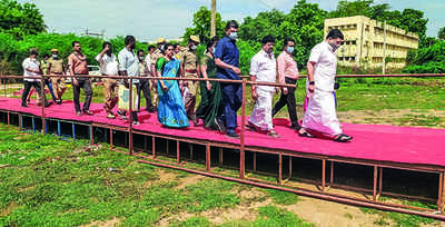 Makeshift bridge to students’ hostel draws ire of minister