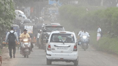 Potholes fixed, but now dust slows down Nashik motorists