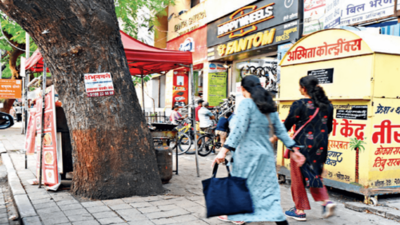 Hawkers get Pune Municipal Corporation stick, but still occupy footpath space