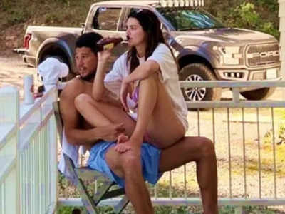 Kendall Jenner sits pantless on beau Devin Booker's lap