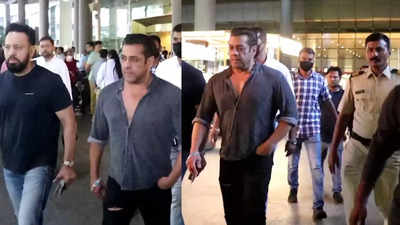 Salman Khan gets clicked surrounded by his trusted bodyguard Shera and a few police personnel at airport as he returns from Dubai vacation
