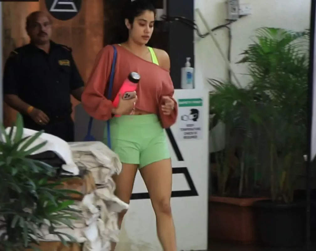 
Janhvi Kapoor opts for comfy pink-coloured cowl top with green-coloured shots
