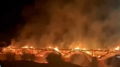 Fire engulfs historic wooden bridge in southern China