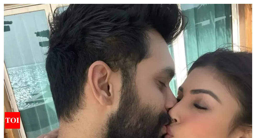 Mouni Roy shares a romantic kiss with her husband Suraj Nambiar as she  wishes him on his birthday â€“ See photos | Hindi Movie News - Times of India