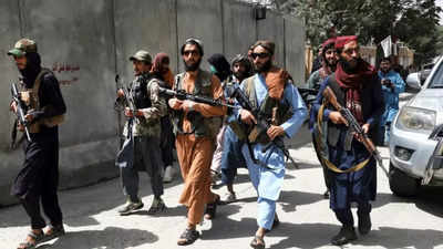 'Happy that infidels are out': Afghan Taliban fighters