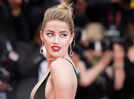 Amber Heard spotted with pal who was barred from Johnny Depp trial