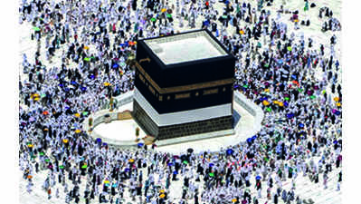 Covid barriers go, pilgrims can now touch Kaaba