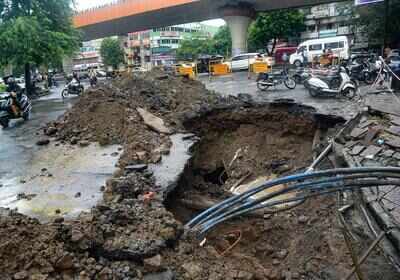 Repair works going to reconstruct the portion of road that had caved in a couple of days ago (Pic: Madhu Kumre) banner img