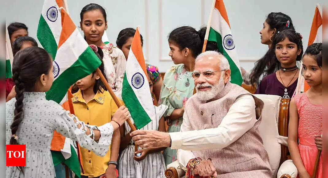 PM Modi celebrates Rakhi with PMO staffers’ kin | India News – Times of India