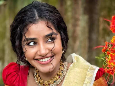 Anupama Parameswaran in curls and ethnic wear