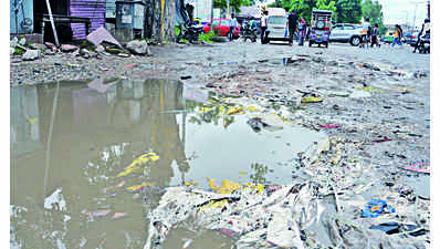 Post-rain, potholes a nightmare for commuters