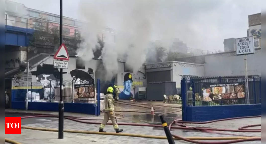 Large fire in central London railway arch halts trains