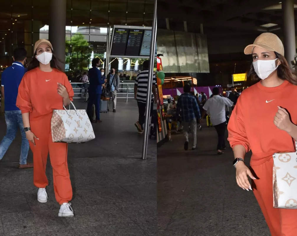 
Parineeti Chopra dons orange-coloured sweatsuit, redefines airport fashion
