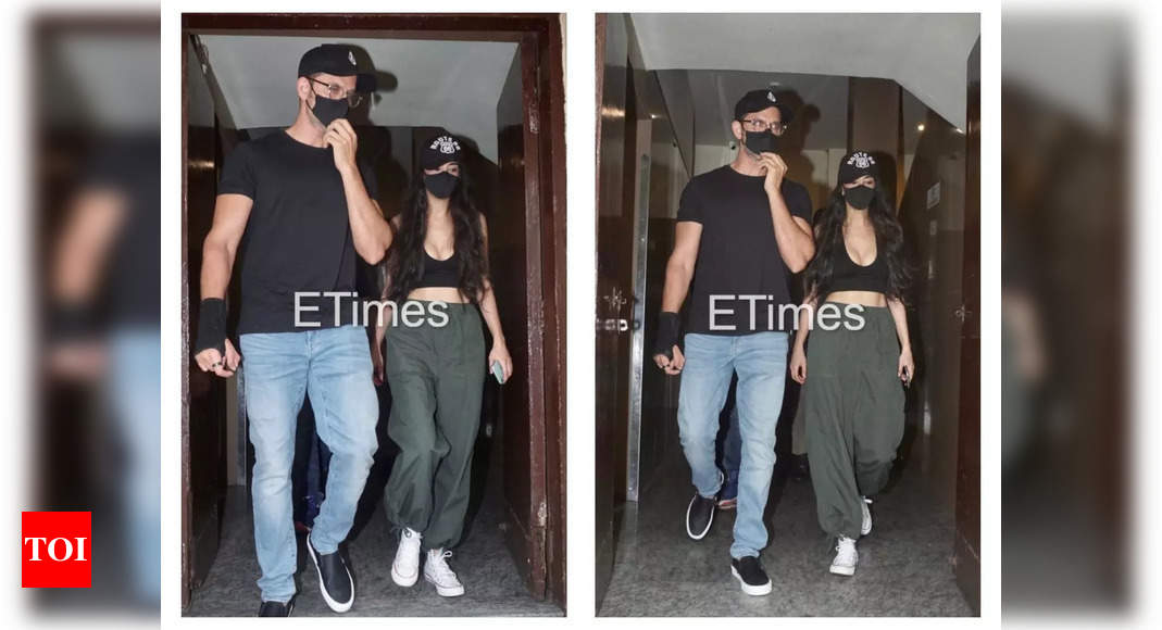 Hrithik Roshan twins in black cap with girlfriend Saba Azad as they get snapped outside a cinema hall in the city – See photos – Times of India
