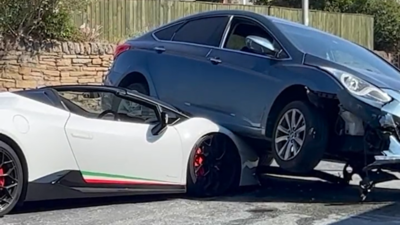 Watch a Hyundai i40 crashing and driving over the bonnet of a Lamborghini  Huracan! - Times of India