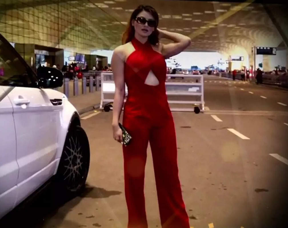 
Urvashi Rautela sizzles in red attire with simple makeup, gets papped at Mumbai airport
