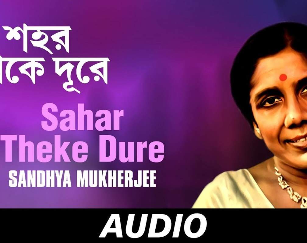 
Check Out The Classic Bengali Video Song 'Sahar Theke Dure' Sung By Sandhya Mukherjee
