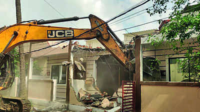 Four illegal row houses demolished