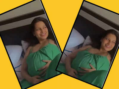 Pregnant Bipasha Basu flaunts her cute baby bump in a green strappy dress, and it is all things adorable