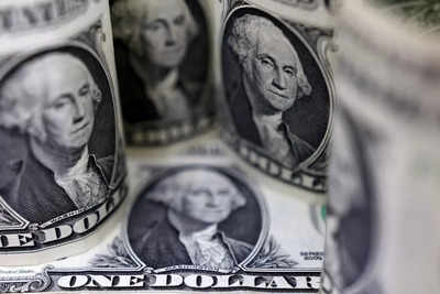 Dollar hits 20-year high as Fed flags rates higher for longer