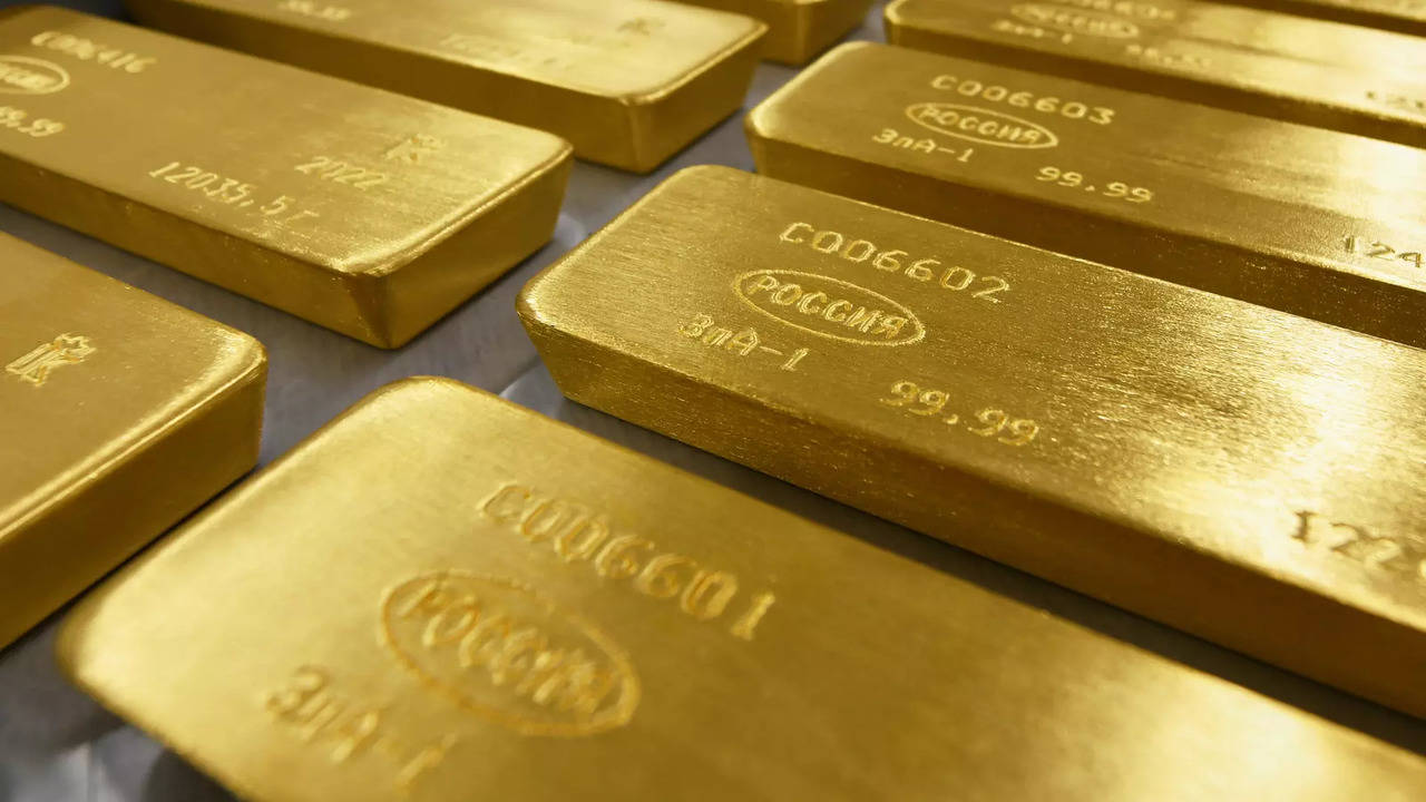 Gold dips as Fed's Powell stays hawkish after holding rates