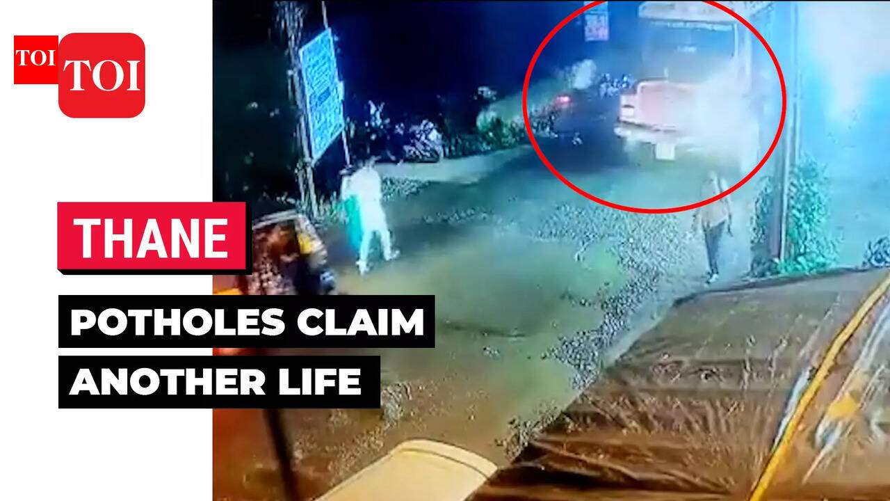 On cam: Man falls on road after bike gets disbalanced due to potholes ...