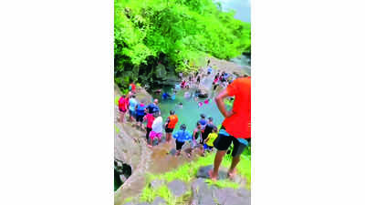 Money ensures free flow of visitors, booze at Secret Point waterfall despite entry ban