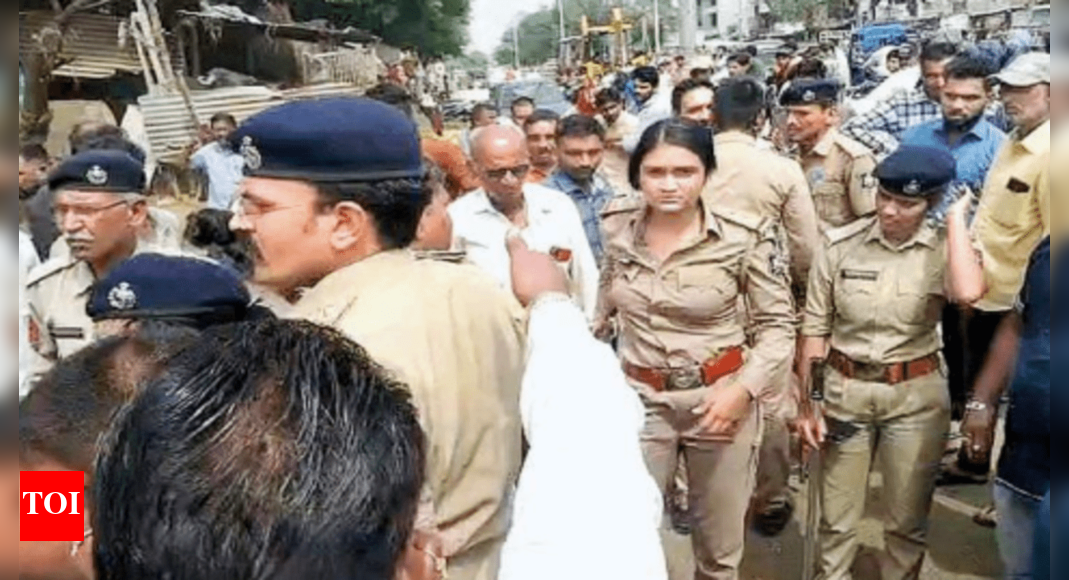 Vadodara: Woman cop roughed up in drive to raze cattle sheds | Vadodara ...